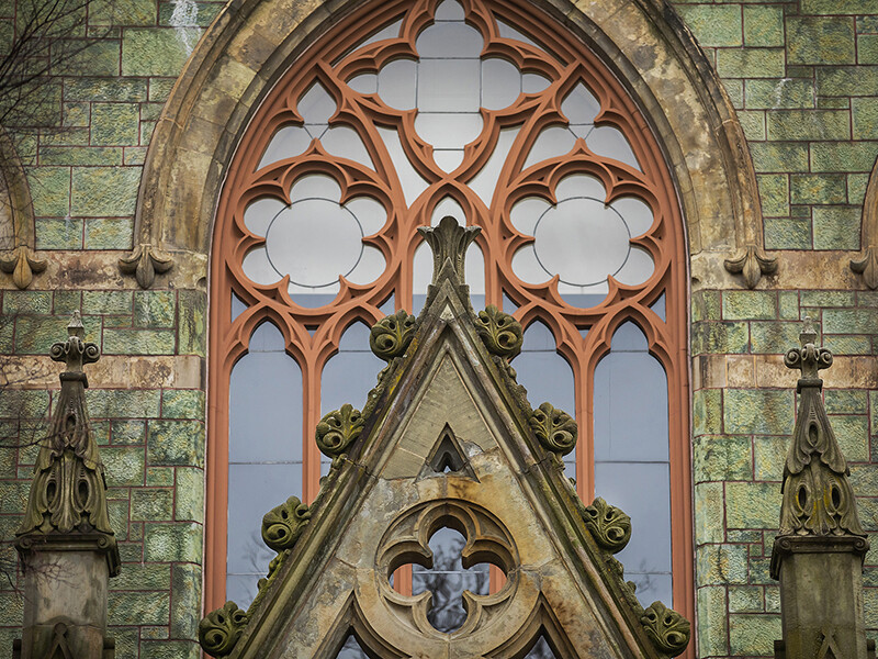 ornate college hall arched window